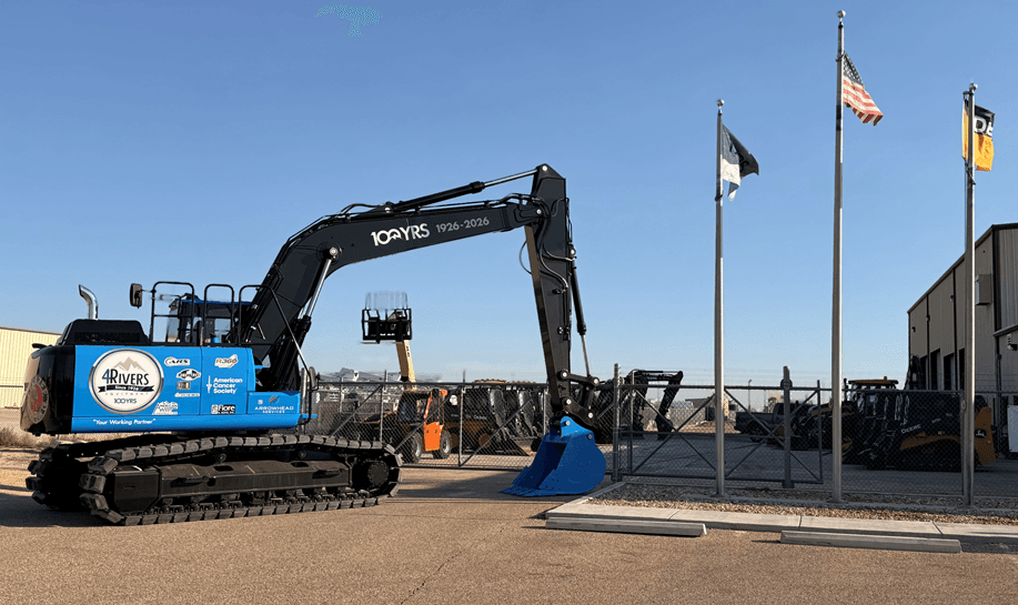 4RE | Our 100 Year excavator, "Big Blue" in front of the Hobbs location.