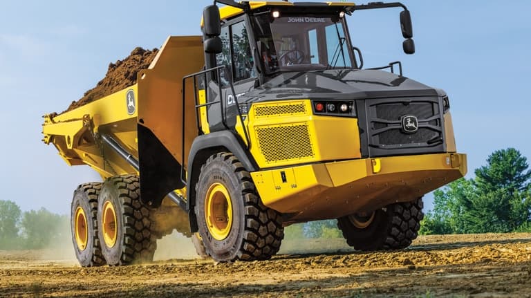 A 260P Articulated Dump Truck hauling dirt. | 4re Equipment