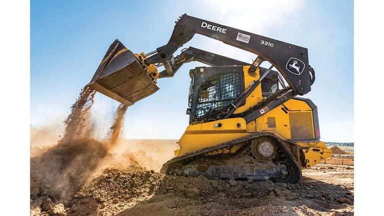 A 331G Compact Track Loader dumping dirt at a worksite. | 4re Equipment