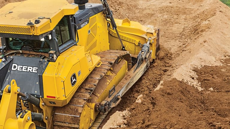 Rear-view close-up of a 950K Dozer on a worksite. | 4re Equipment