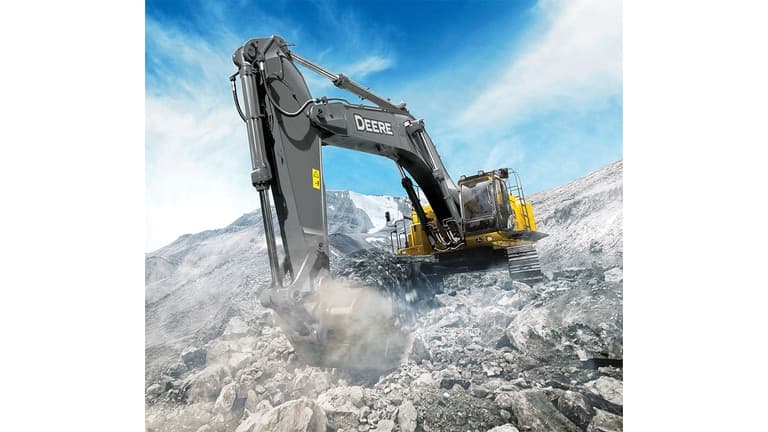 A 670P-Tier Excavator scooping up rock in a quarry worksite. | 4re Equipment