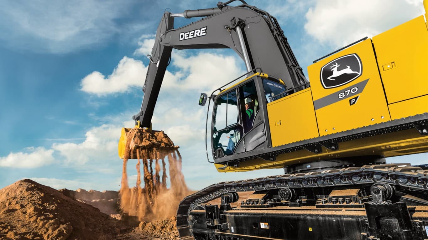 An operator using the 870P-Tier Excavator to move dirt at a worksite. | 4re Equipment | ID: 870PEXFT4